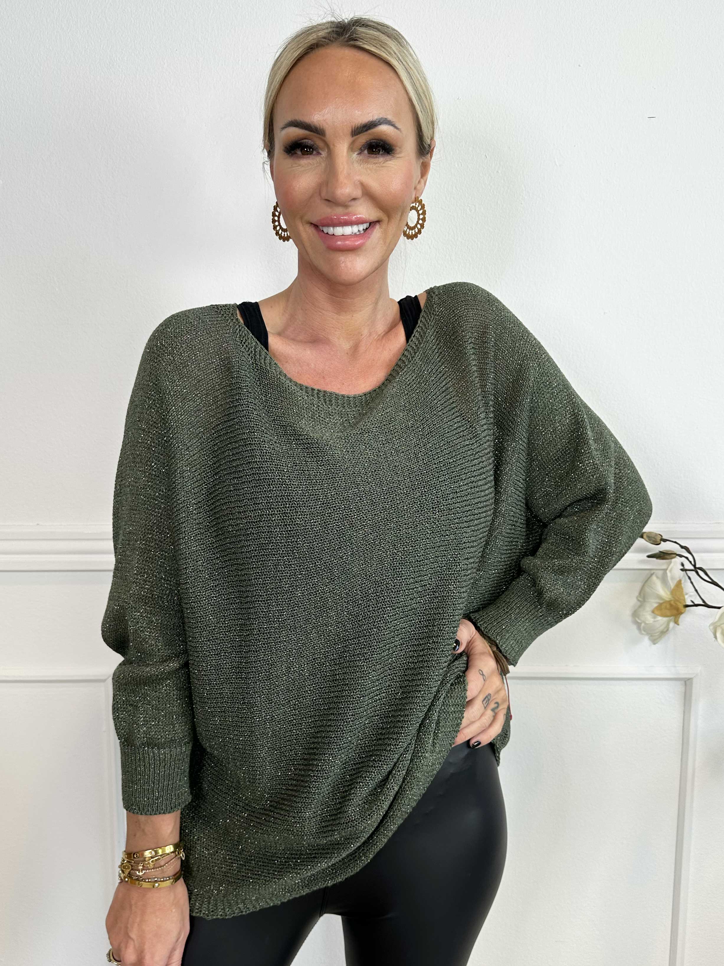 Paulina - Stickad blus med glittertrådar och rosett